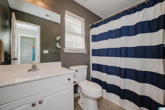 full bath featuring tile patterned flooring, visible vents, toilet, vanity, and a shower with curtain