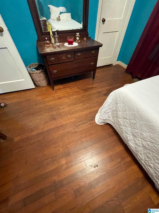 bedroom featuring hardwood / wood-style floors