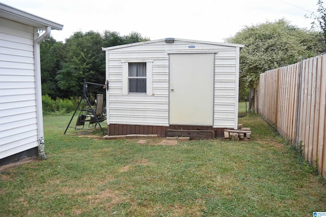 view of outdoor structure featuring a yard