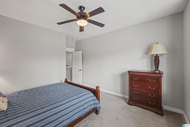 bedroom with light colored carpet and ceiling fan