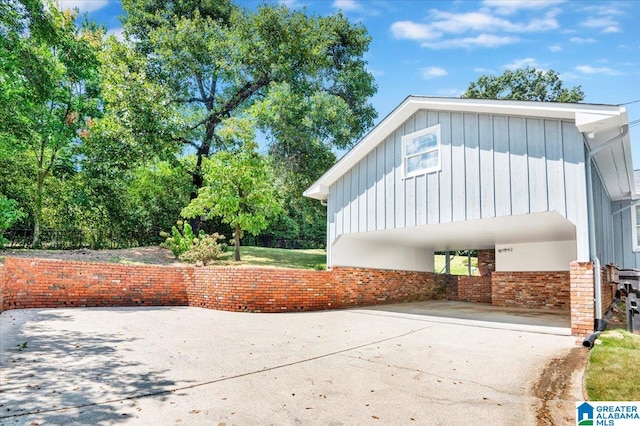 exterior space featuring a carport