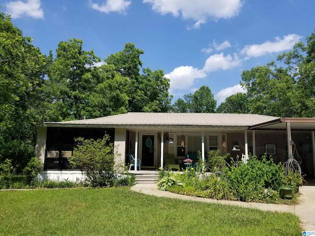 view of front of house with a porch and a front lawn