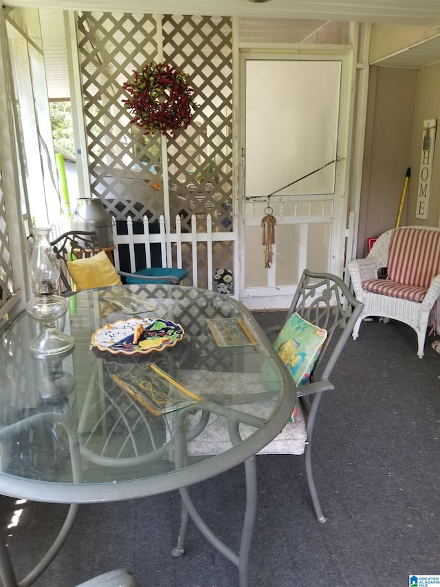 view of carpeted dining space