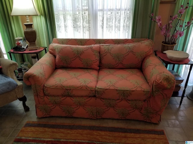 living room with tile patterned flooring