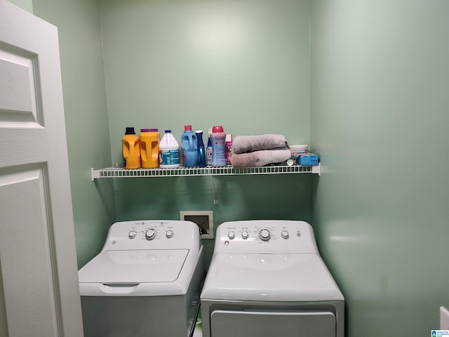 laundry area with washer and dryer and laundry area