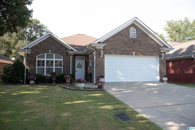 ranch-style home with a garage, brick siding, driveway, and a front lawn