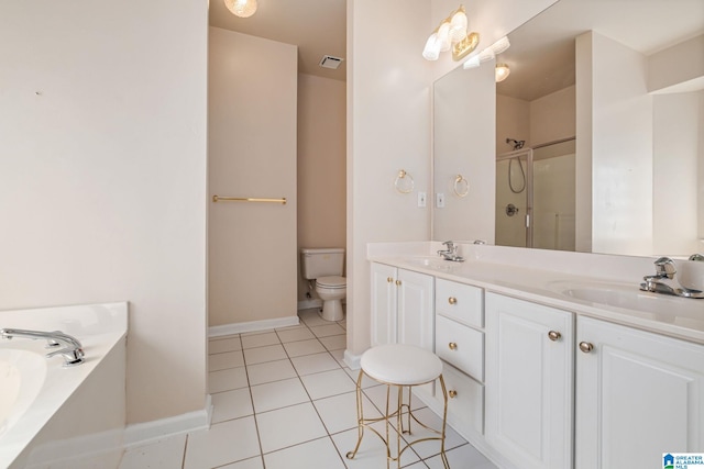 full bathroom with shower with separate bathtub, toilet, vanity, and tile patterned floors