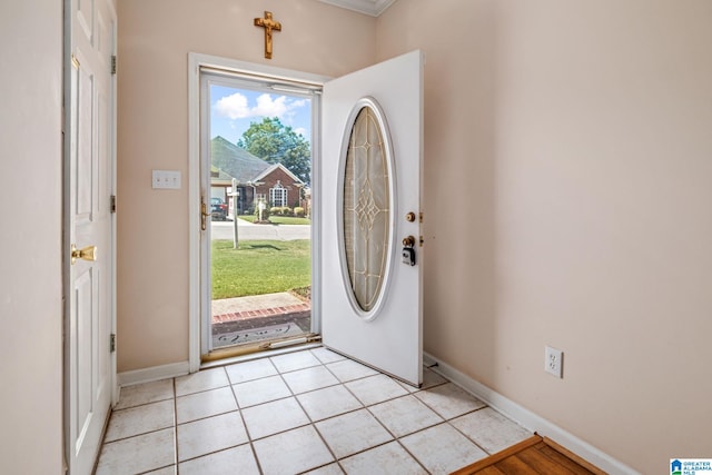 entrance foyer with light tile patterned flooring