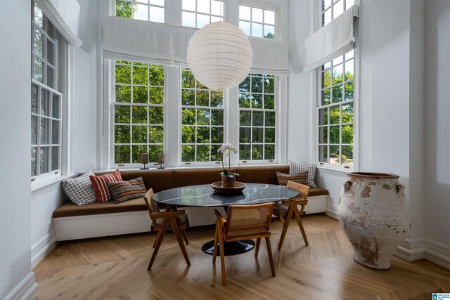 sunroom featuring breakfast area