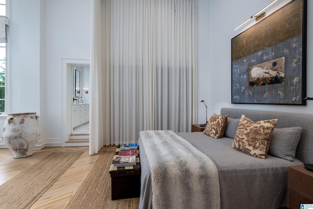 bedroom with wood-type flooring