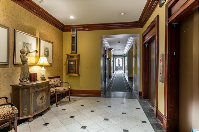 corridor with crown molding, elevator, and light hardwood / wood-style floors