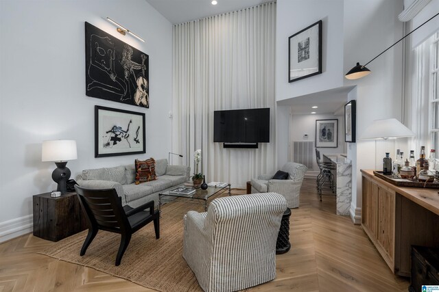 living room featuring light parquet floors