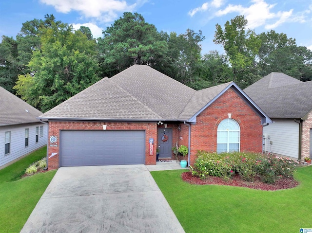 view of front facade with a garage and a front yard