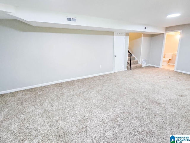 basement with carpet flooring