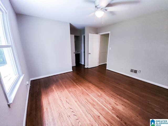 unfurnished bedroom featuring ceiling fan and wood-type flooring