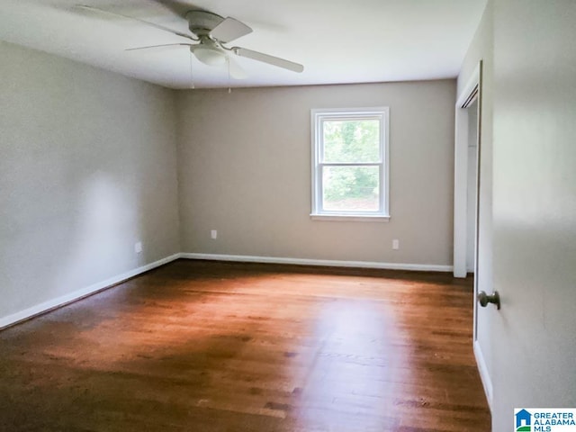 unfurnished room featuring ceiling fan and wood-type flooring