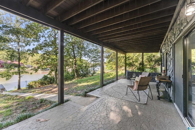 view of patio / terrace featuring a water view