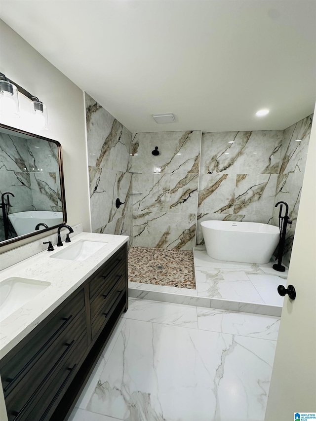 bathroom with tile walls, separate shower and tub, and vanity