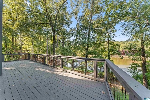 wooden deck featuring a water view