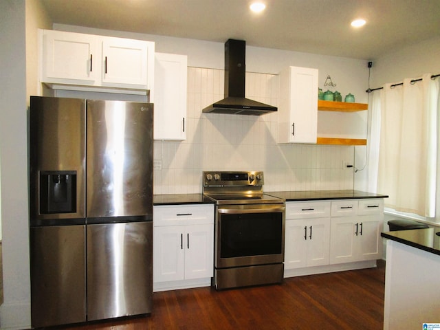 kitchen with stainless steel appliances, dark hardwood / wood-style floors, wall chimney range hood, and white cabinets