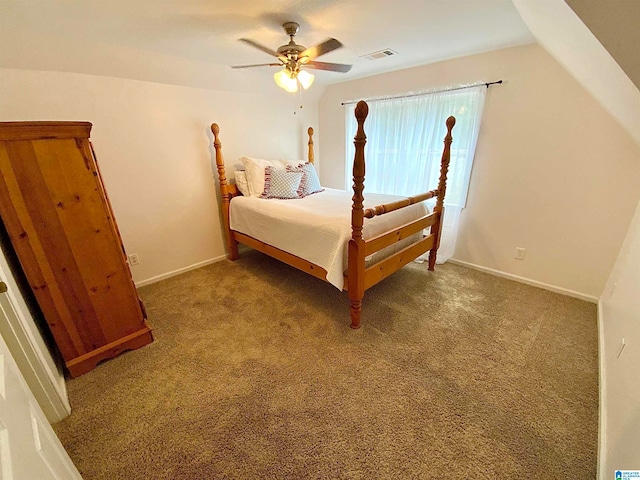 carpeted bedroom featuring lofted ceiling and ceiling fan