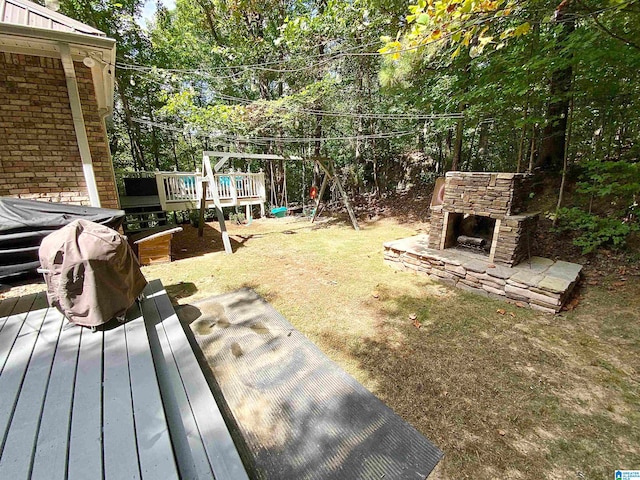 view of yard featuring a wooden deck