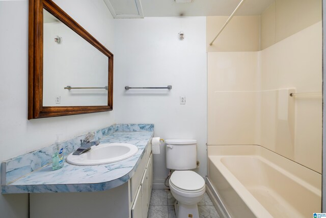 full bathroom featuring vanity, toilet, tile patterned flooring, and shower / bath combination