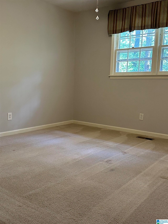 empty room with carpet floors