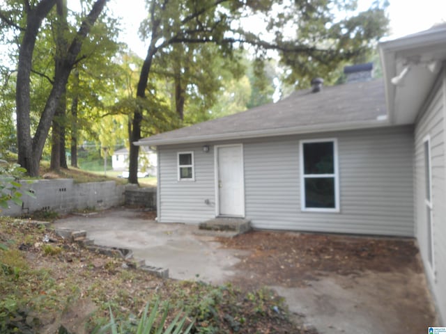 rear view of house with a patio