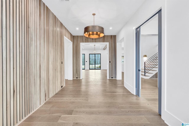 hallway featuring light hardwood / wood-style flooring