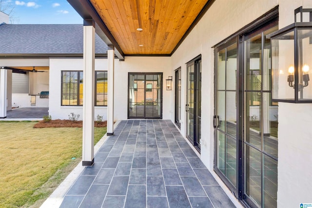 view of patio / terrace featuring ceiling fan