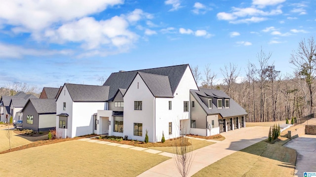 exterior space featuring a front lawn