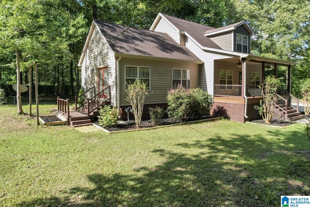 view of front facade featuring a front lawn and ceiling fan