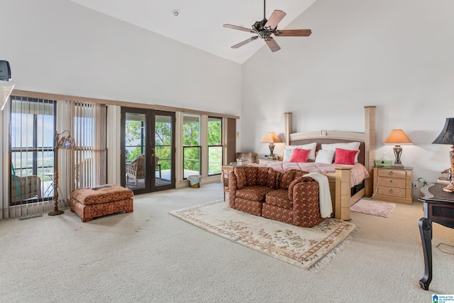 bedroom featuring ceiling fan, access to exterior, light carpet, and high vaulted ceiling