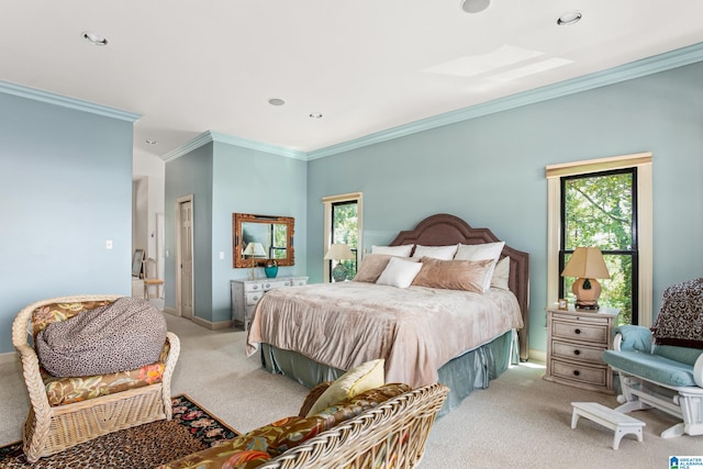 carpeted bedroom with ornamental molding