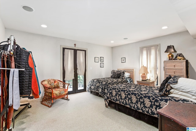 carpeted bedroom featuring access to outside