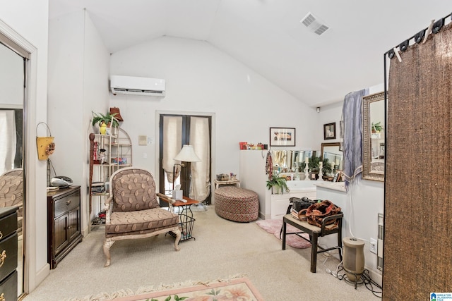 living area with light colored carpet, an AC wall unit, and vaulted ceiling