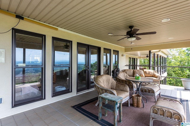 view of patio with ceiling fan