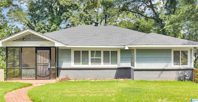 view of front of house with a front lawn