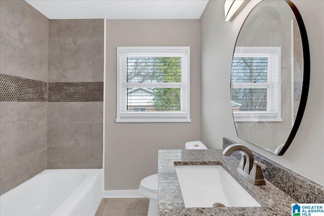 full bathroom with tile patterned flooring, vanity, toilet, and plus walk in shower