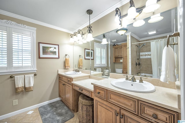 bathroom with crown molding, vanity, and tile patterned floors