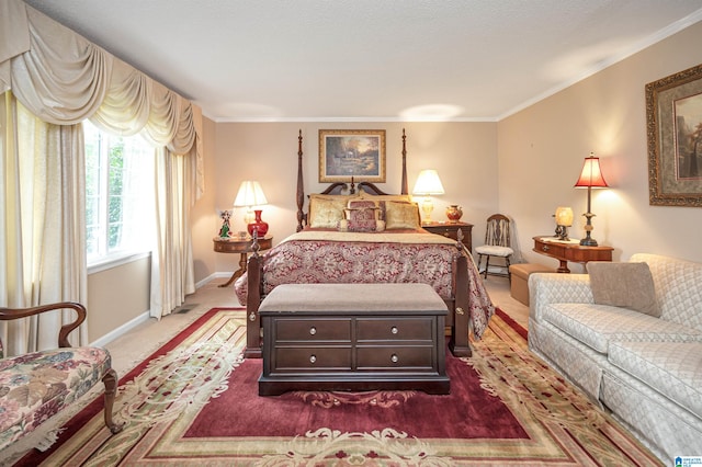 carpeted bedroom with ornamental molding