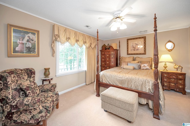 carpeted bedroom featuring crown molding and ceiling fan