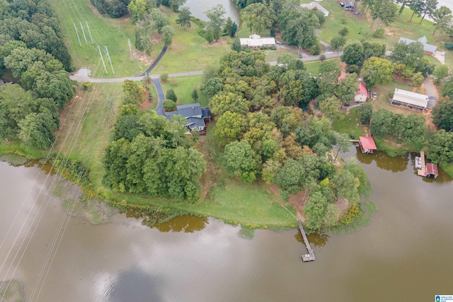 drone / aerial view featuring a rural view and a water view