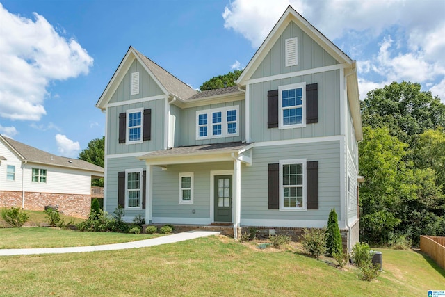 craftsman-style house featuring a front lawn