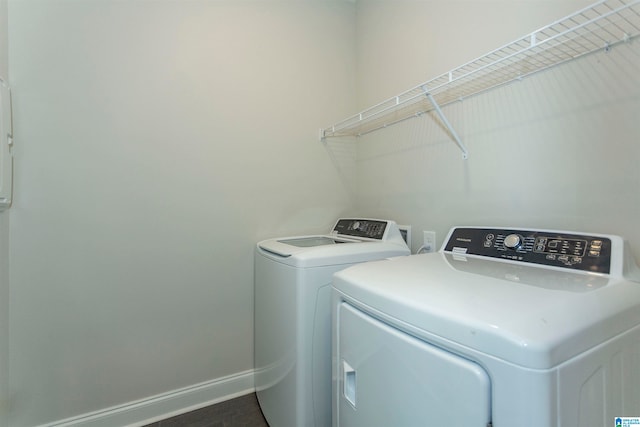 washroom with washer and dryer