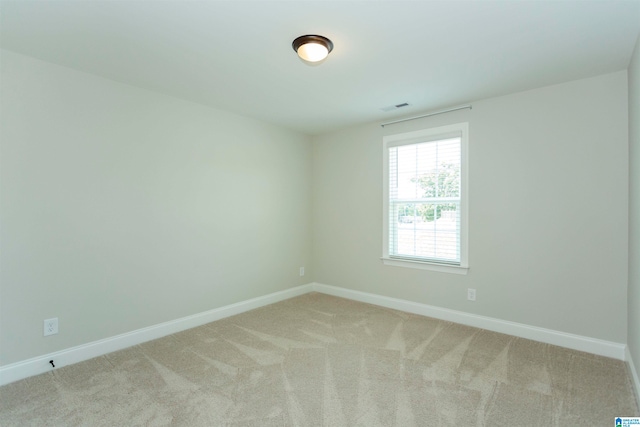 unfurnished room with carpet floors