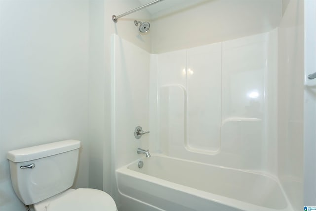 bathroom featuring toilet and tub / shower combination