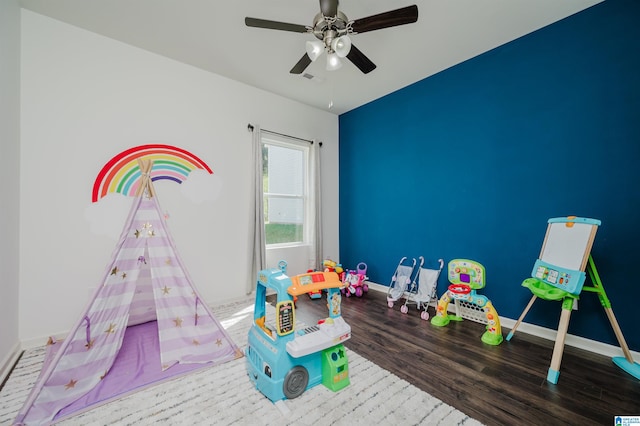 playroom featuring ceiling fan and hardwood / wood-style flooring