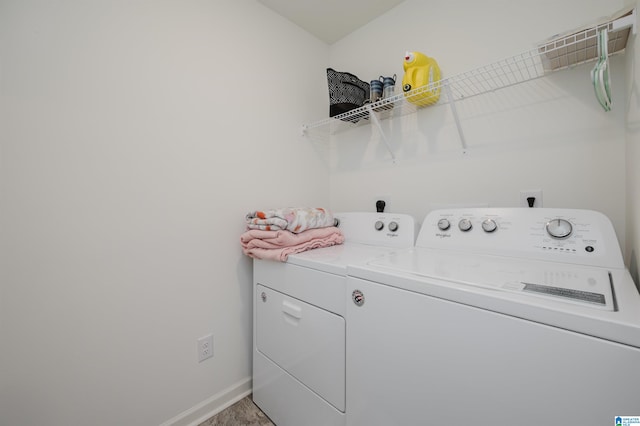 laundry area with washing machine and dryer